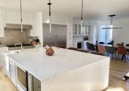 Large Kitchen Remodel. White finish Cabinets and Stainless Steal Appliance.