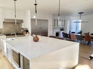 Large Kitchen Remodel. White finish Cabinets and Stainless Steal Appliance.