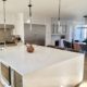 Large Kitchen Remodel. White finish Cabinets and Stainless Steal Appliance.